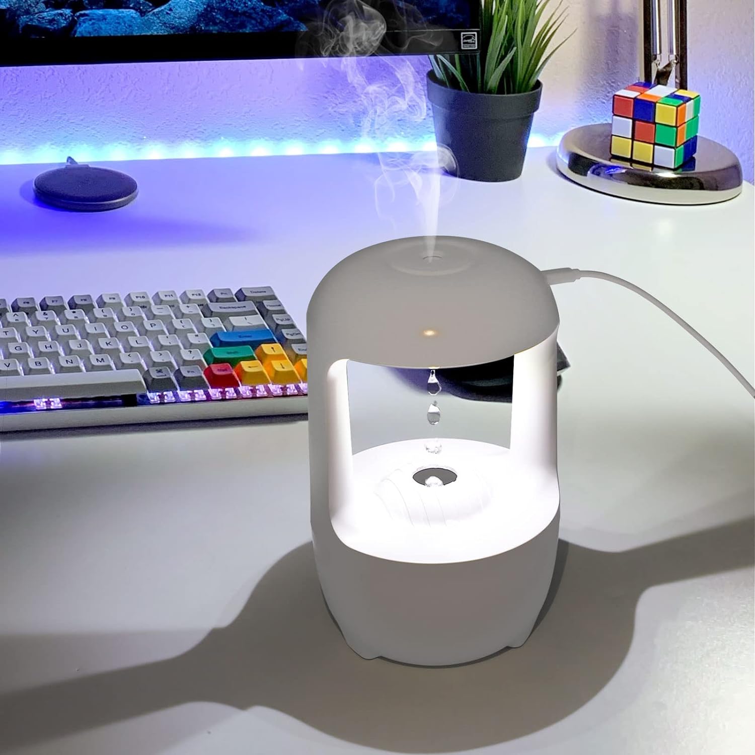 Humidificador Antigravedad — vapor en habitación oscura